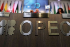 Oil prices fall on higher OPEC output, rise in US crude stocks